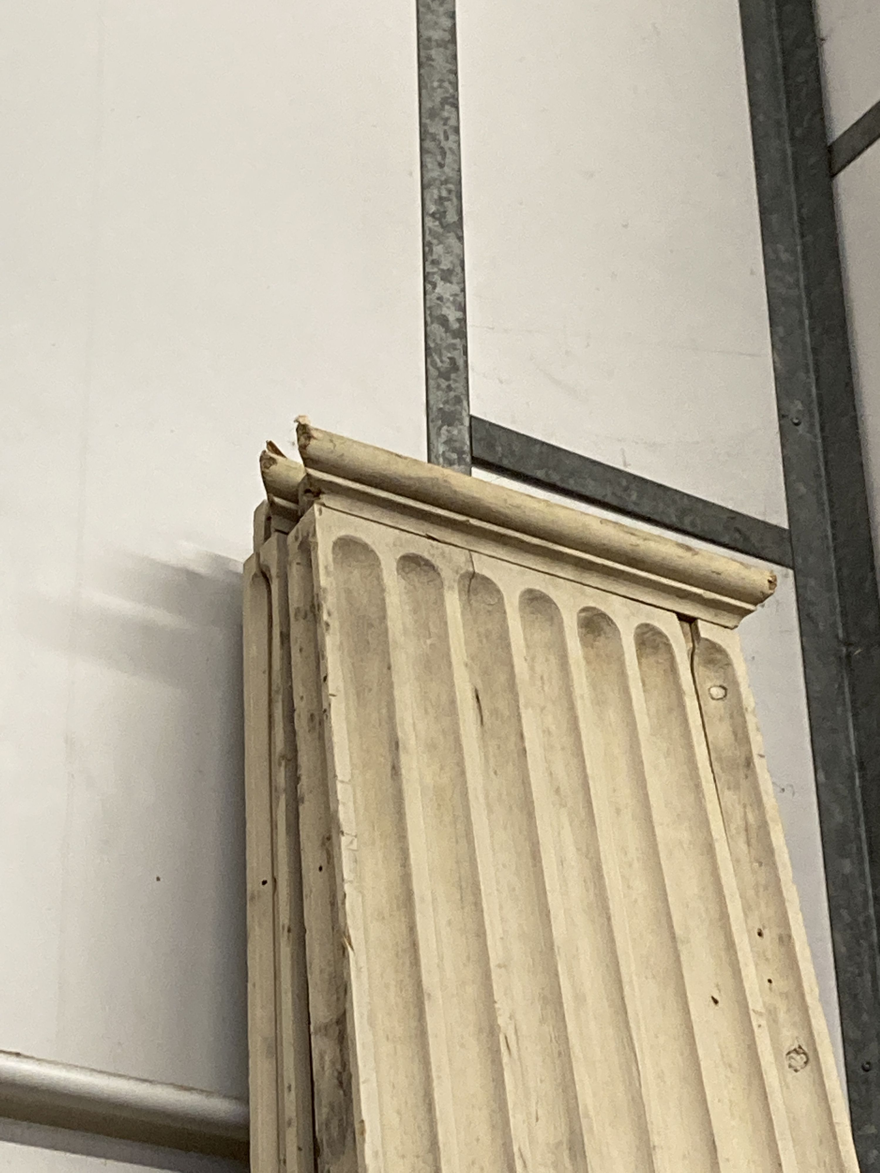 A pair of painted pine classical fluted wainscot columns, width 33cm, height 294cm